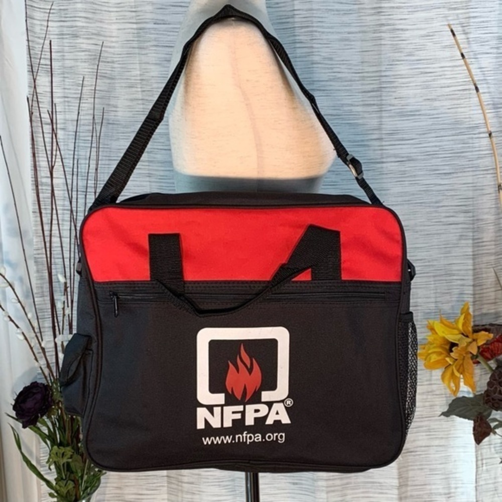 Leed’s red and black computer/book bag.